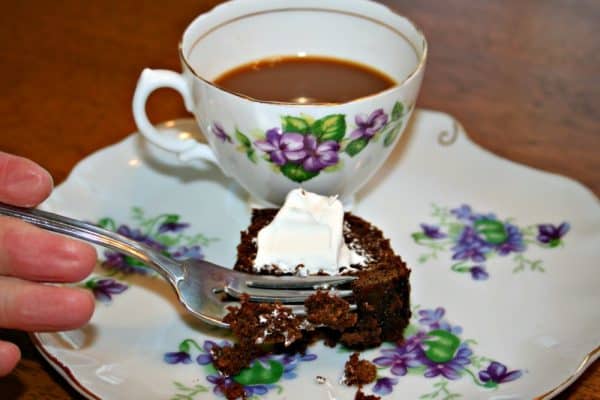 Enjoying homemade gingerbread Gingerbread on a plate.