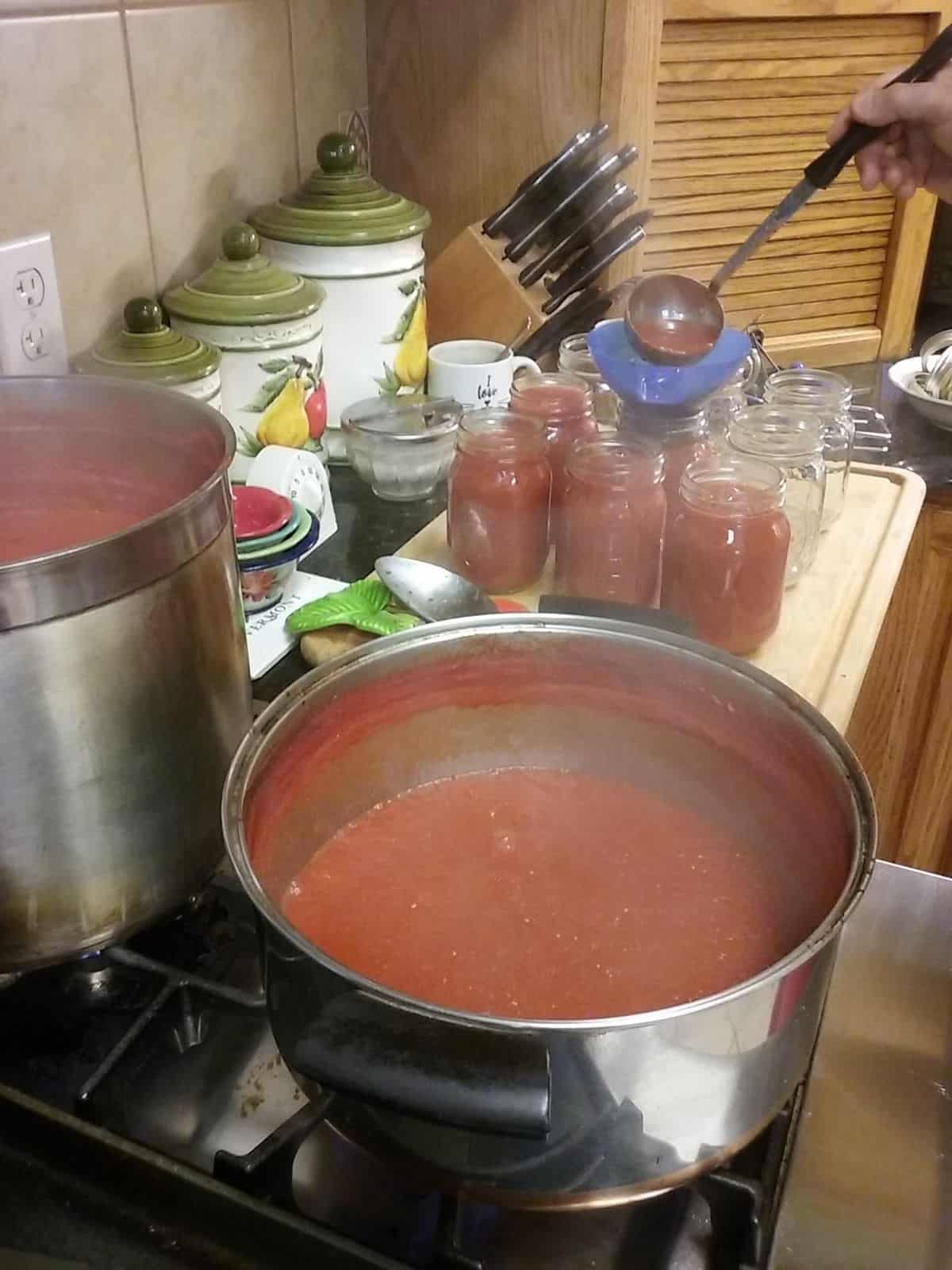 homemade tomato sauce cooking on the stove