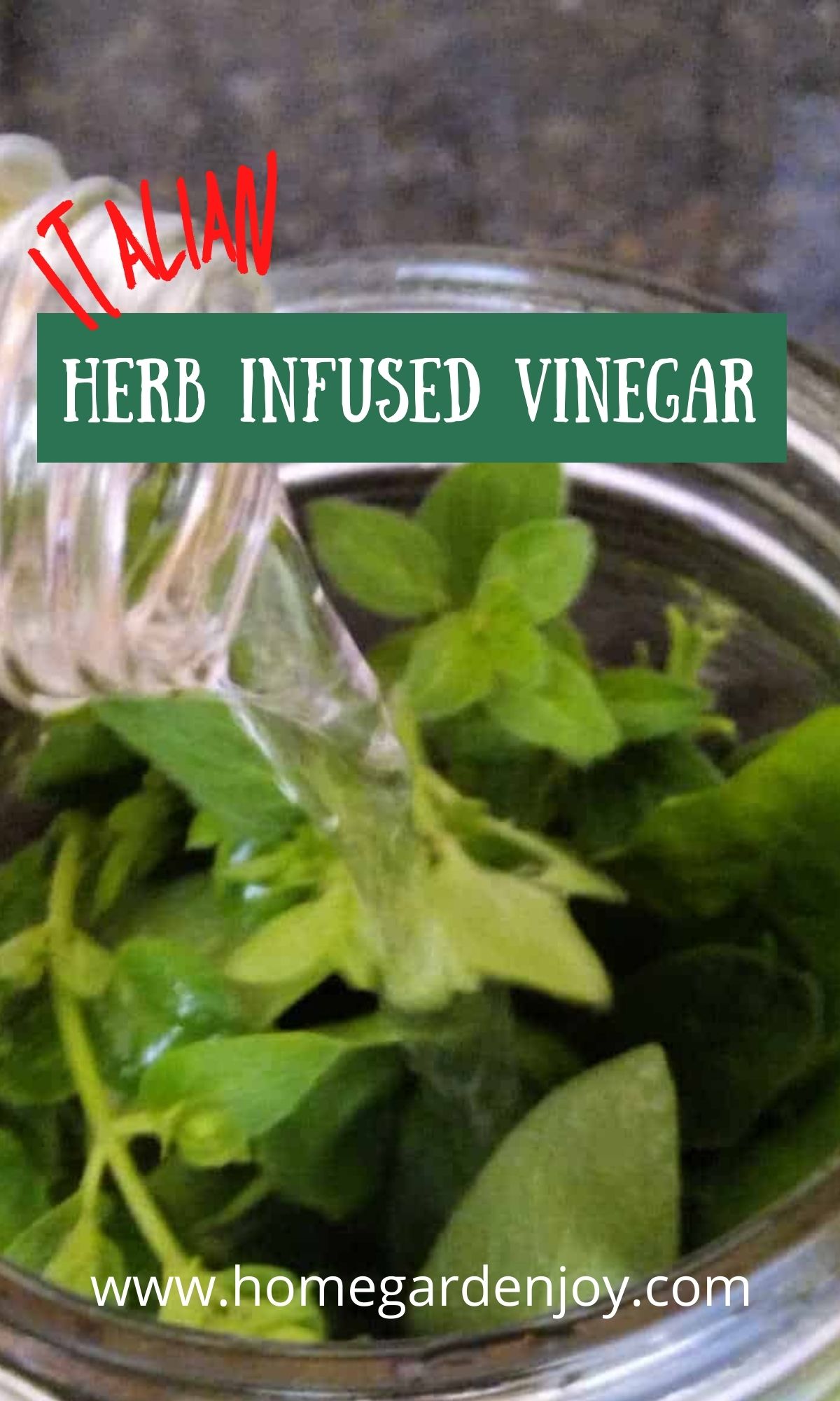 vinegar pouring over herbs in a jar