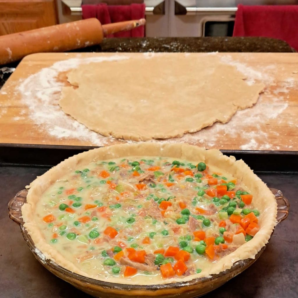 the filling and top crust of a chicken pot pie