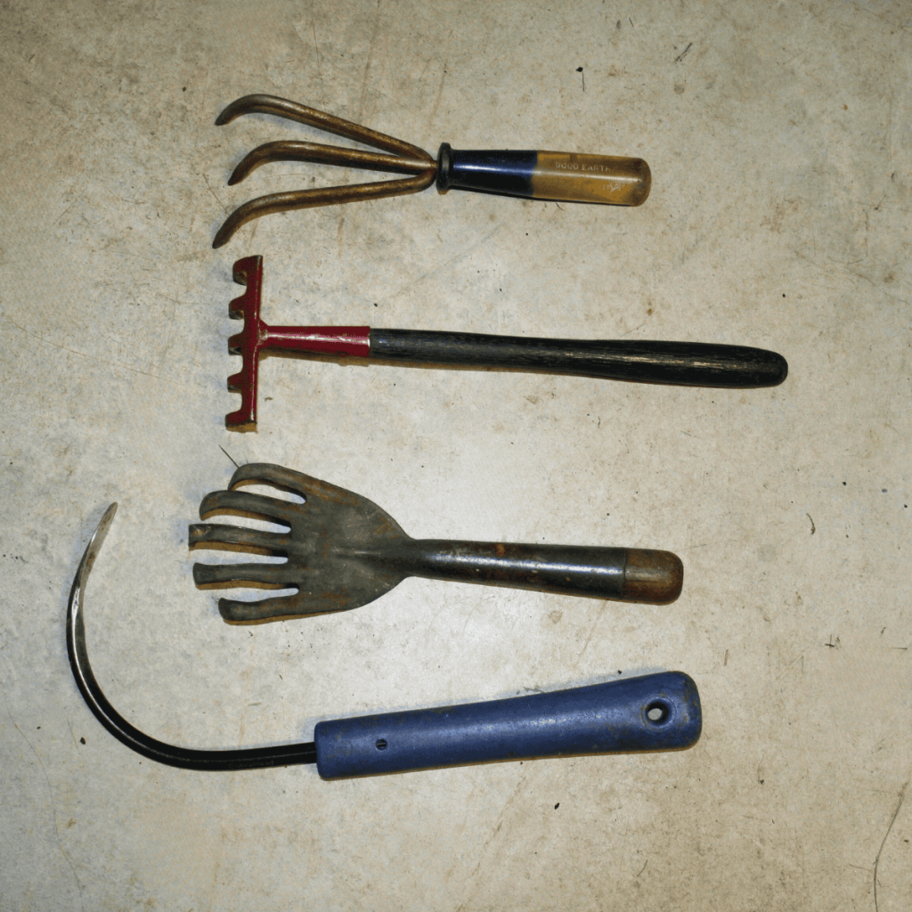 four weeding and cultivating hand tools